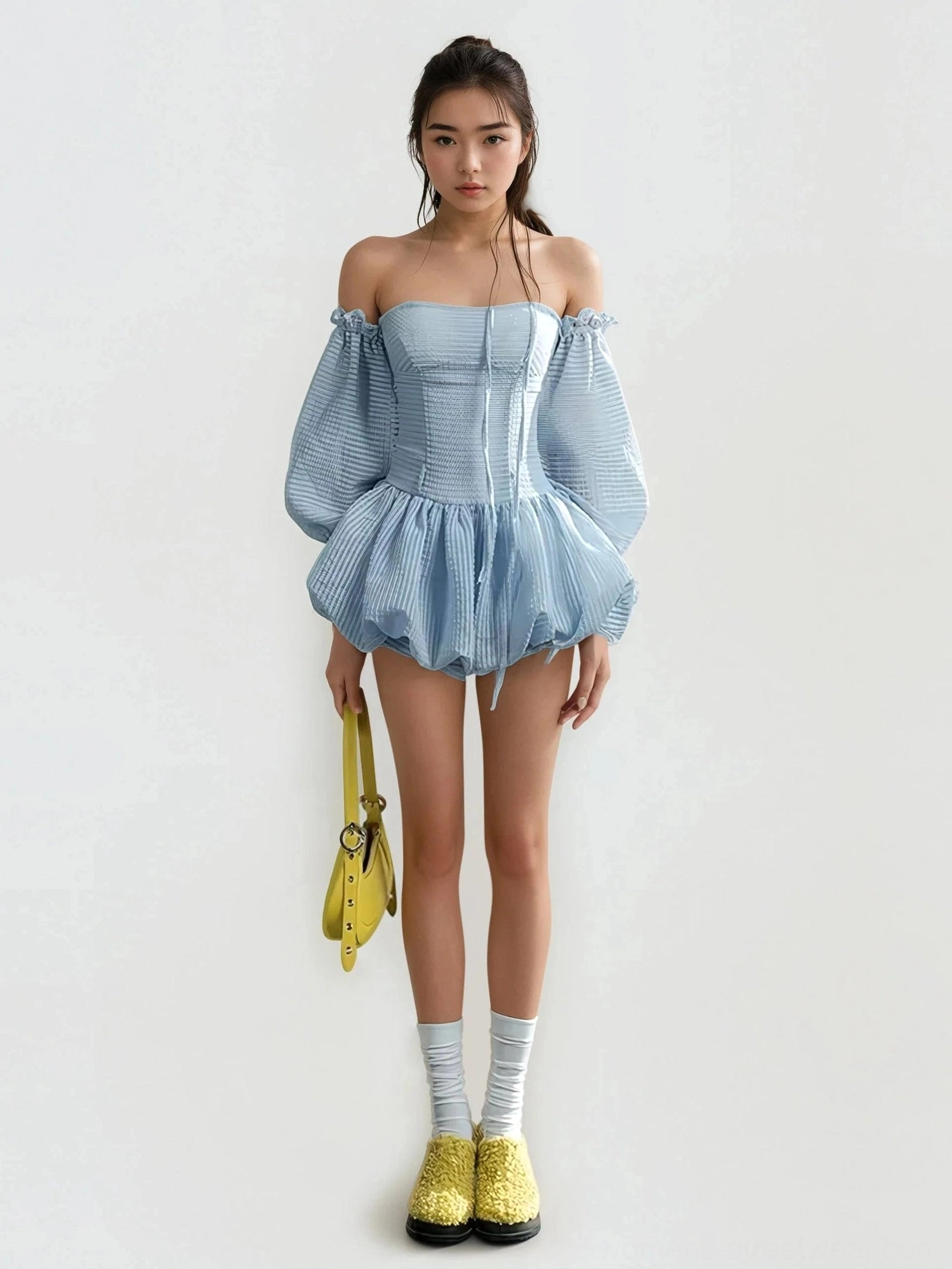 Light blue gingham puff sleeve mini romper dress with off shoulder neckline, ruffled bubble hem, yellow shoulder bag and platform loafers in Korean streetwear styling