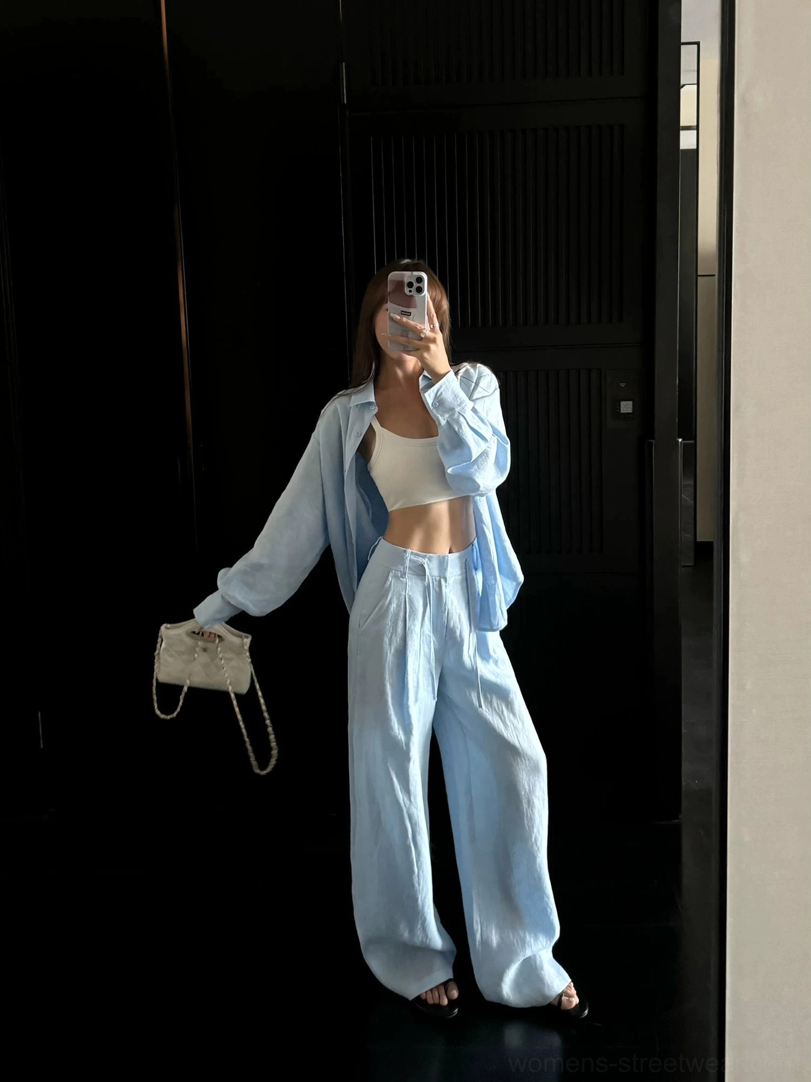 Light blue high-waisted linen trousers wide leg relaxed fit oversized silhouette minimalist
