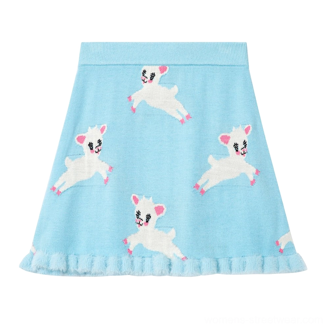 Flat lay of light blue lamb print knit A-line mini skirt with playful fuzzy ruffle hem