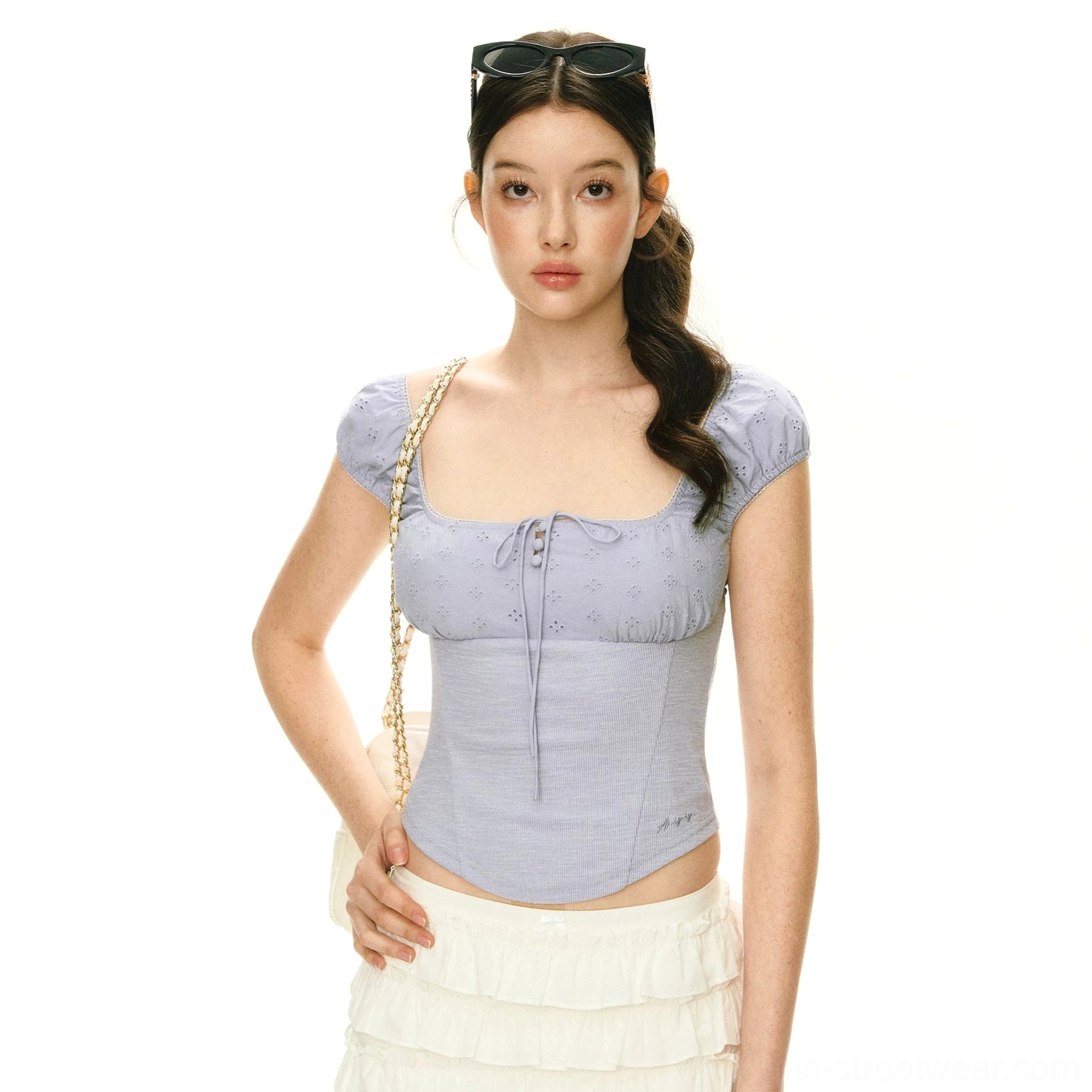 Light blue lavender textured puff sleeve corset crop top with square neckline styled with ruffled skirt