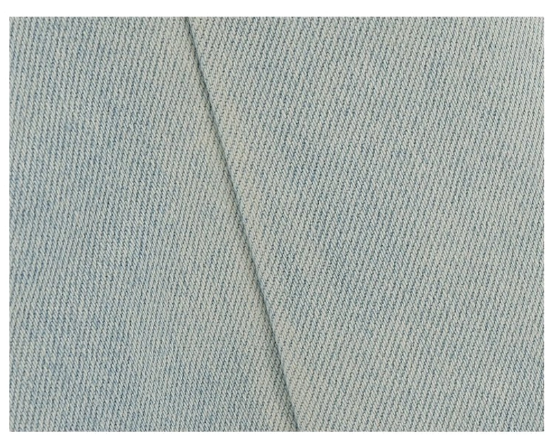 Light blue relaxed wide-leg jeans designed for casual layering with cropped tops, sweaters, and jackets
