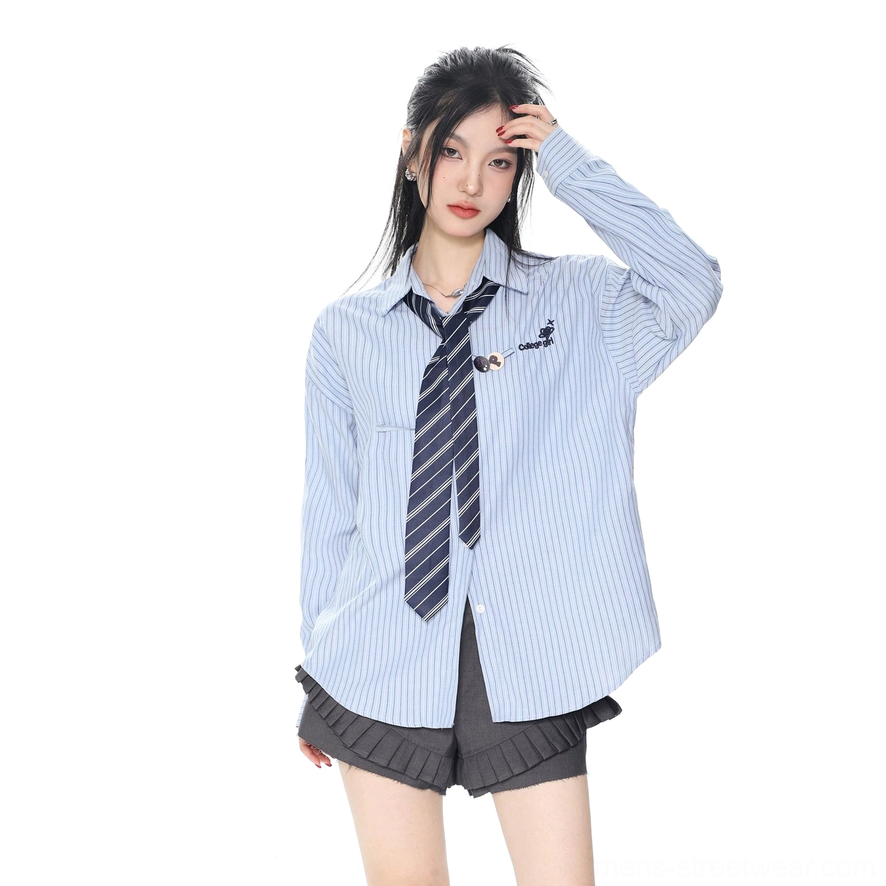 Light blue vertical striped dress shirt with tie and chest detail styled with dark grey shorts