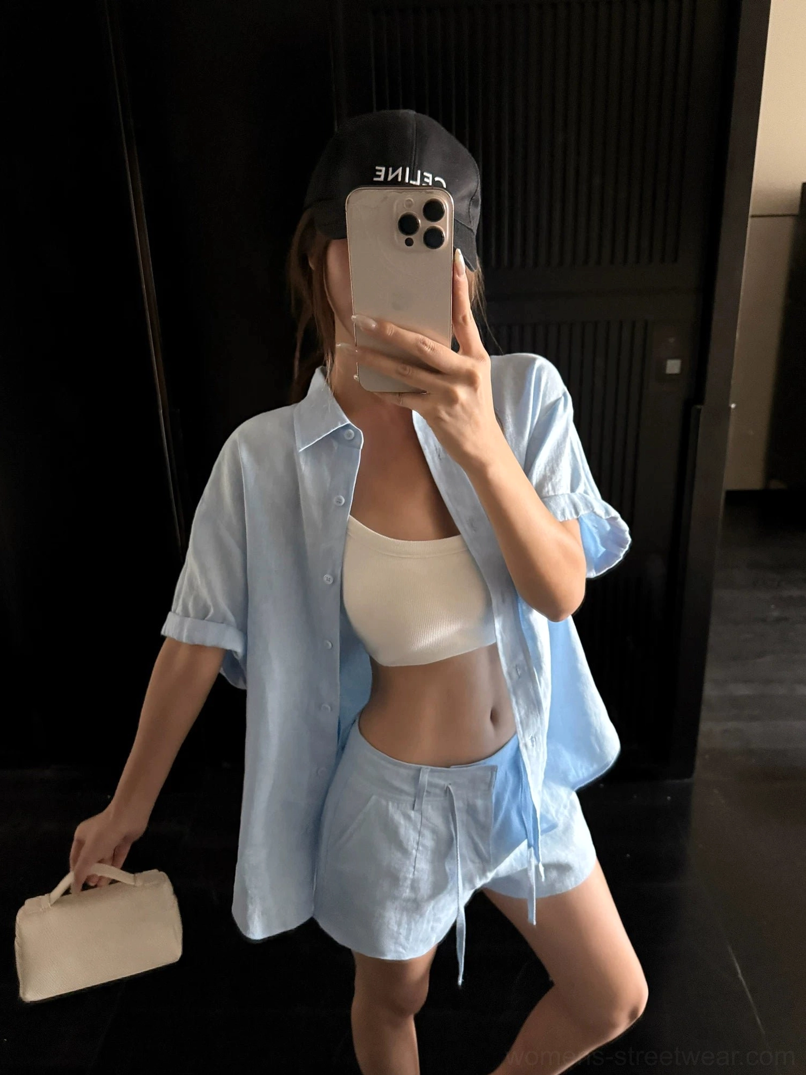 Light blue washed ramie linen oversized shirt with drawstring shorts, indoor mirror selfie with baseball cap streetwear styling