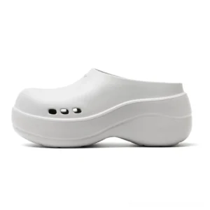 Light gray chunky platform slip-on clogs with matte finish, rounded closed toe, breathable vamp vents, and comfortable wavy sole
