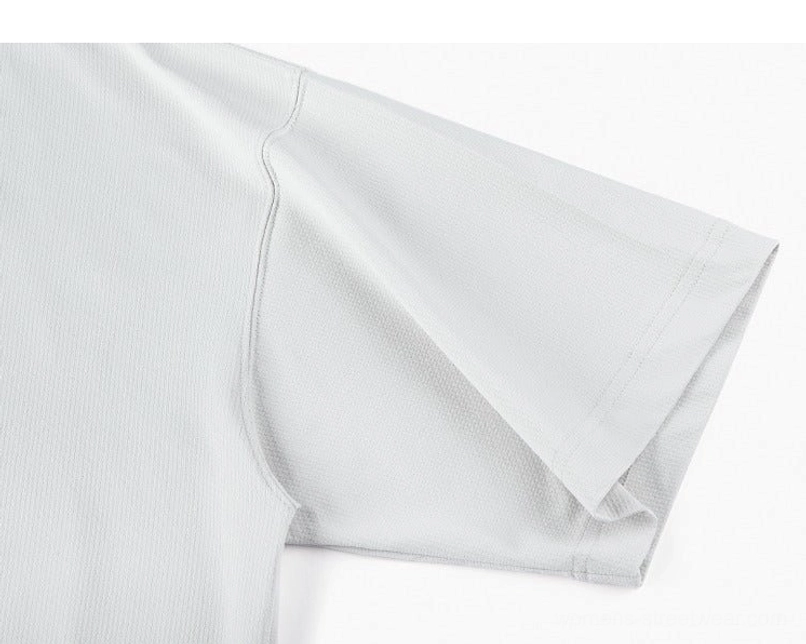 Close-up sleeve and side seam detail of light gray oversized relaxed fit Korean streetwear tee