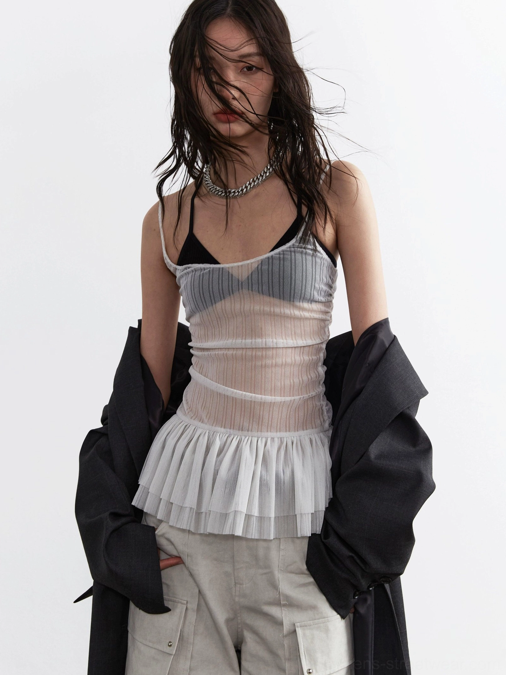 Light gray sheer pleated corset top close front view showing square spaghetti strap neckline transparent mesh and black underlayer