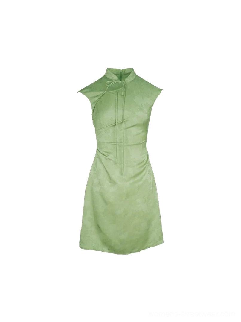 Flat lay view of light green satin cheongsam mini dress with stand collar tie decoration, sleeveless tailored fit, and glossy fabric