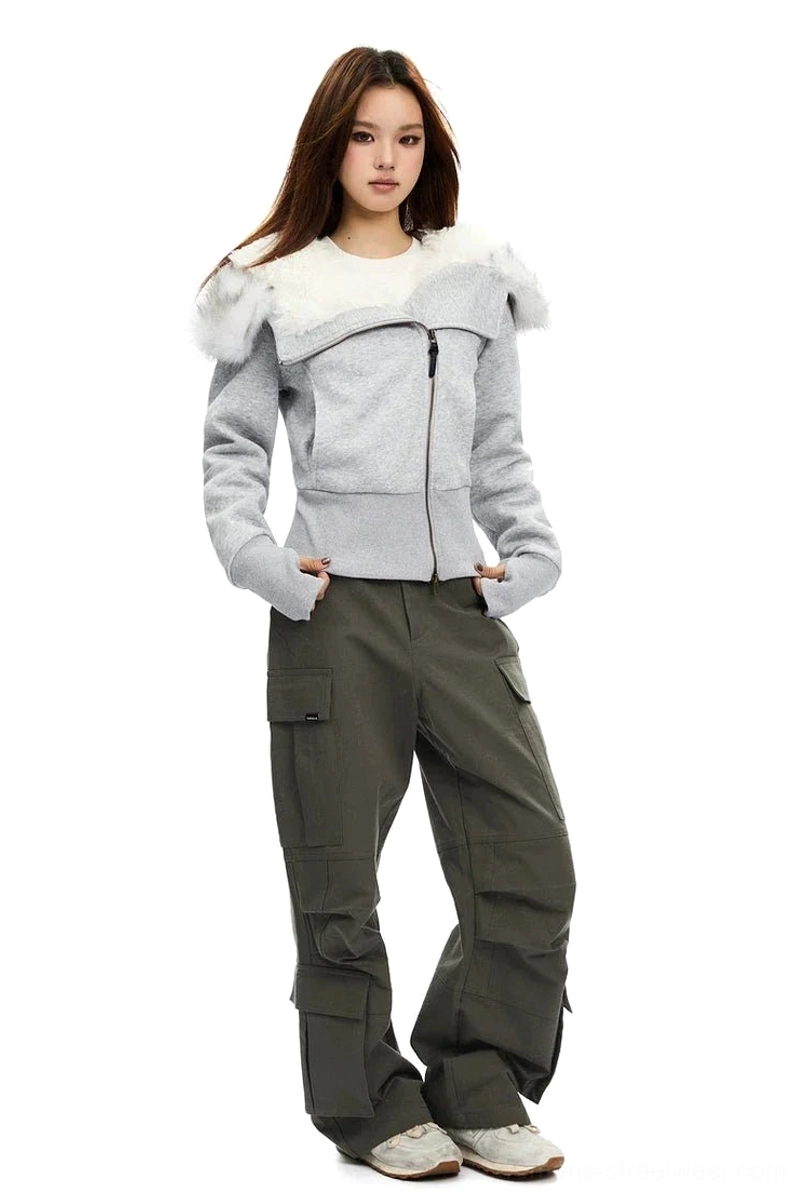 Full body view of a slim Light Grey cropped hooded sweatshirt with white faux-fur trim, front zip pockets, cargo pants, and sneakers
