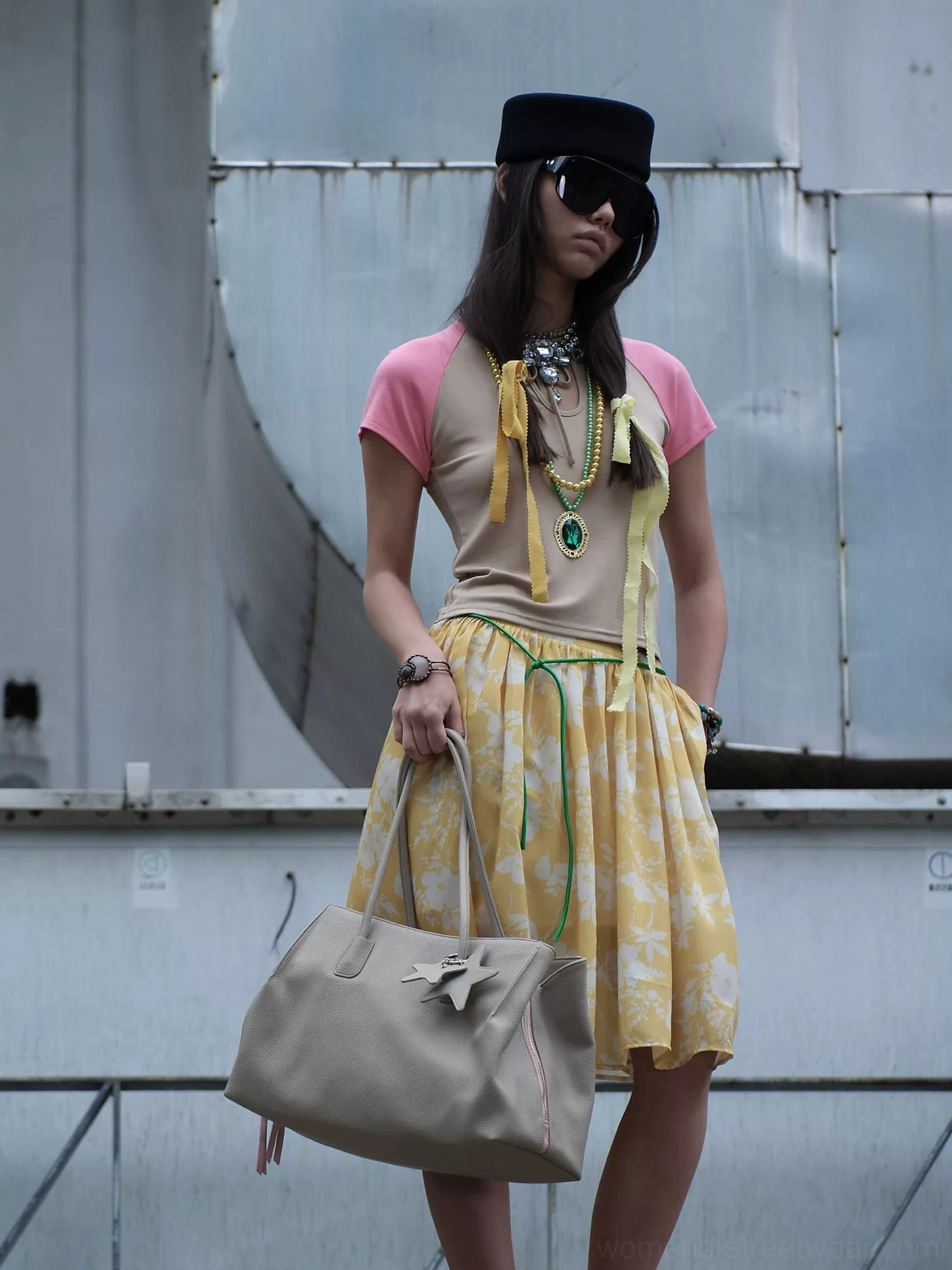 Light grey structured streetwear tote bag with star charms pink tassel and rectangular commuter silhouette