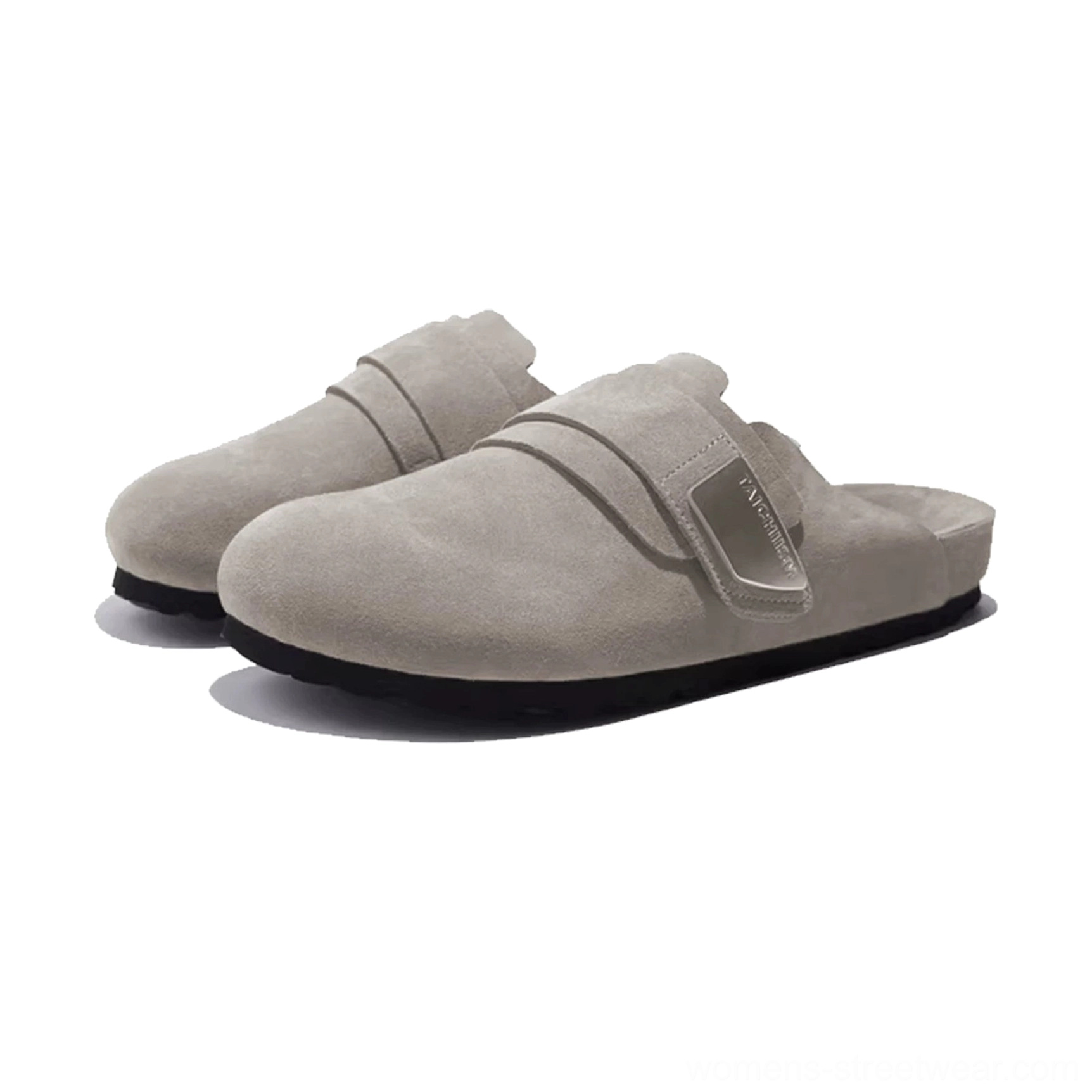Light grey suede mule sandal close-up showing soft leather texture adjustable metal buckle and black outsole