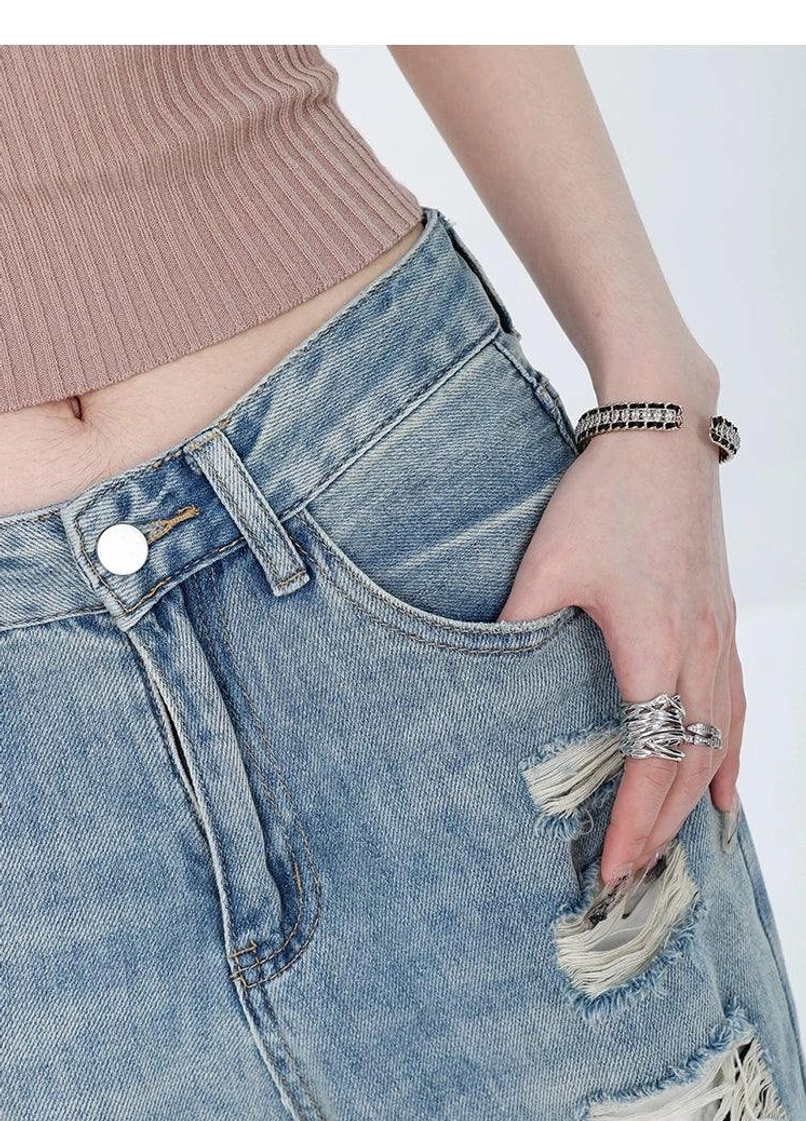 Light wash distressed high-waist wide-leg grunge jeans oversized full-length denim silhouette product image