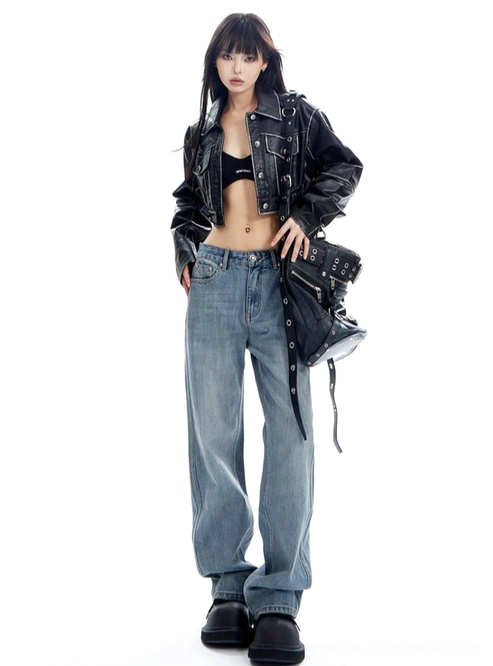 Front three-quarter view showing the relaxed drape and wide-leg shape of light wash blue denim jeans in a contemporary Korean streetwear outfit
