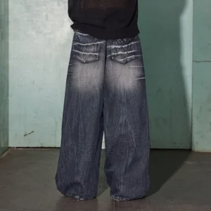 Rear view of oversized lightning wash wide-leg jeans showing rear patch pockets and washed denim detailing