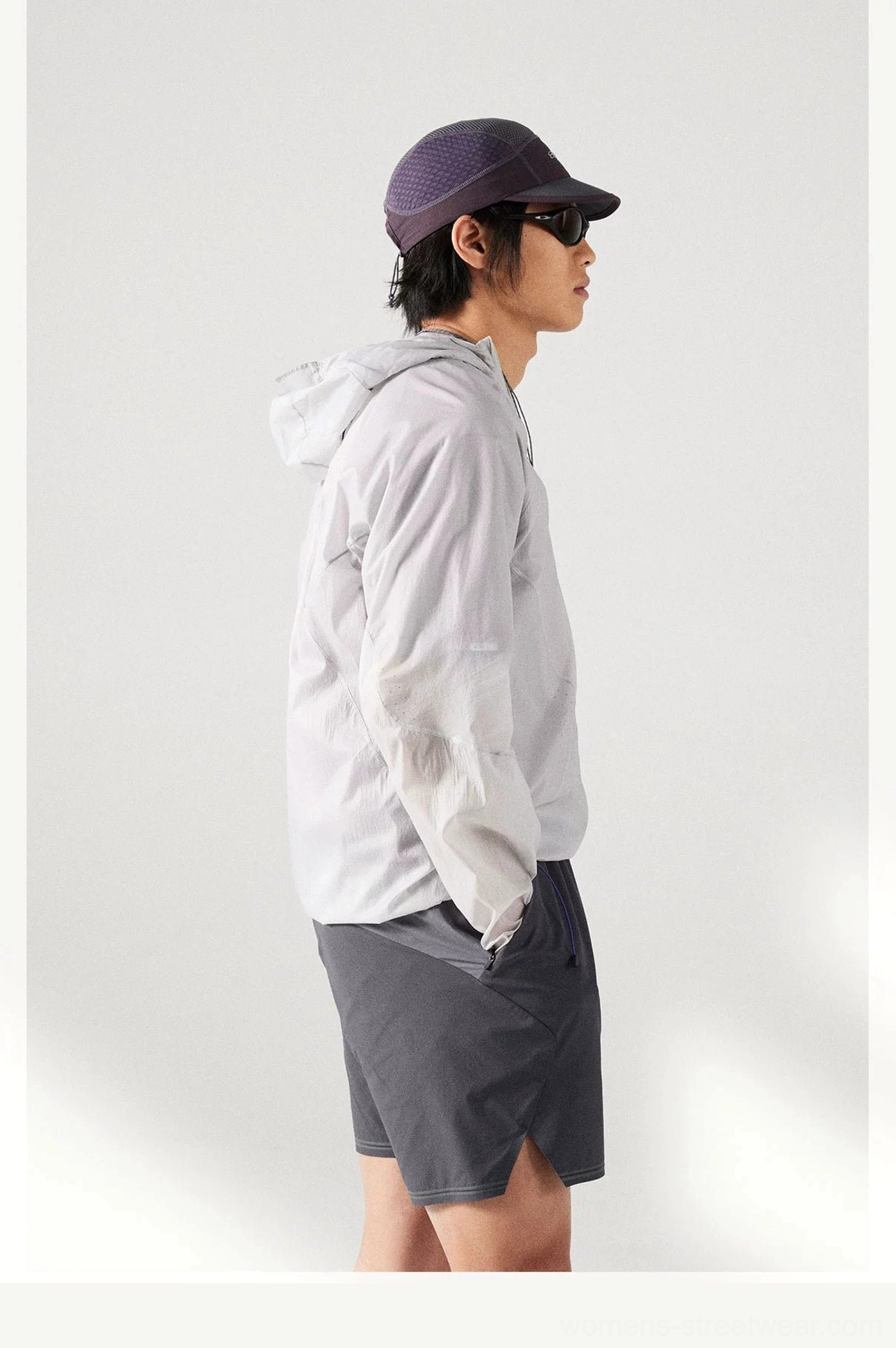 Lightweight hooded windbreaker jacket with UPF 50+ sun protection and water-repellent outdoor construction