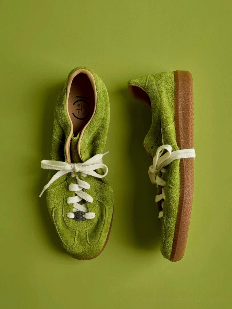 Lime green vintage suede German army style streetwear sneakers with white laces and gum rubber soles shown in an overhead flat lay