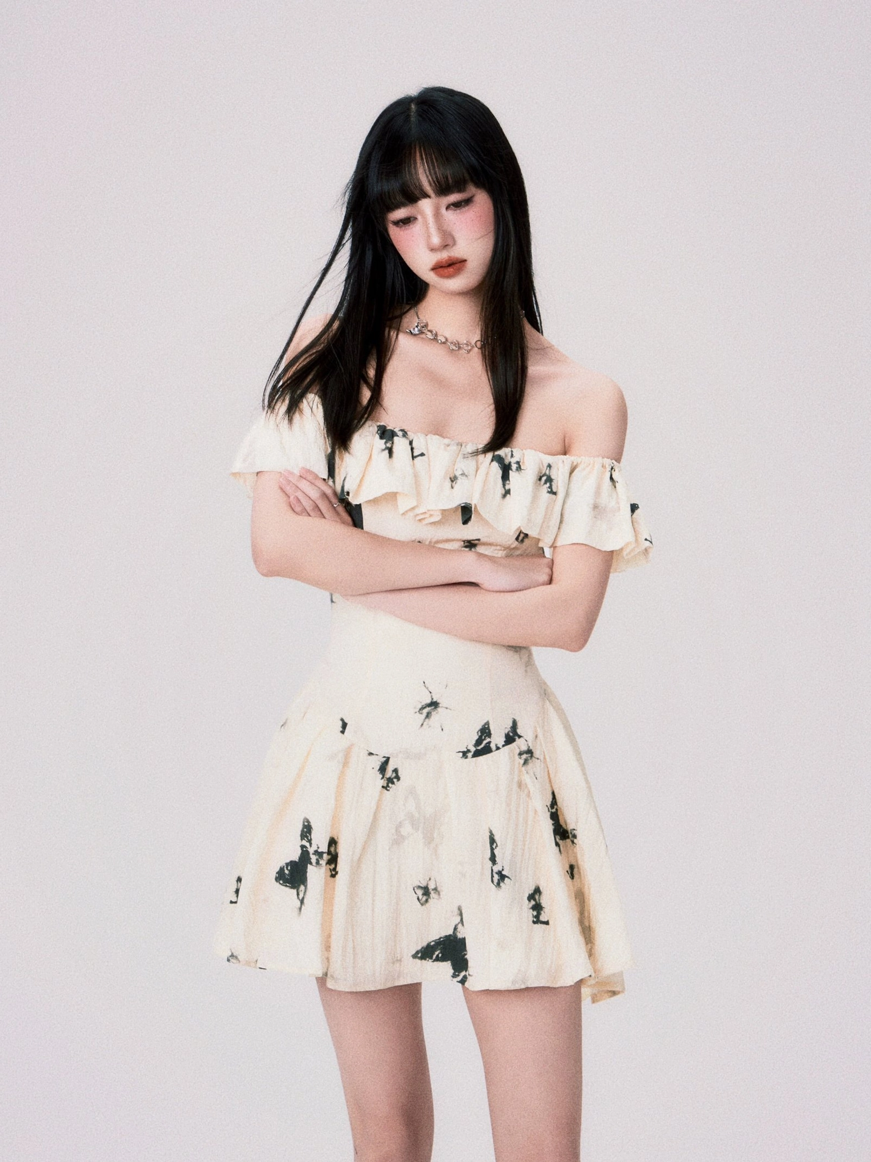 Long ink butterfly off-shoulder ruffle dress flowing maxi silhouette view