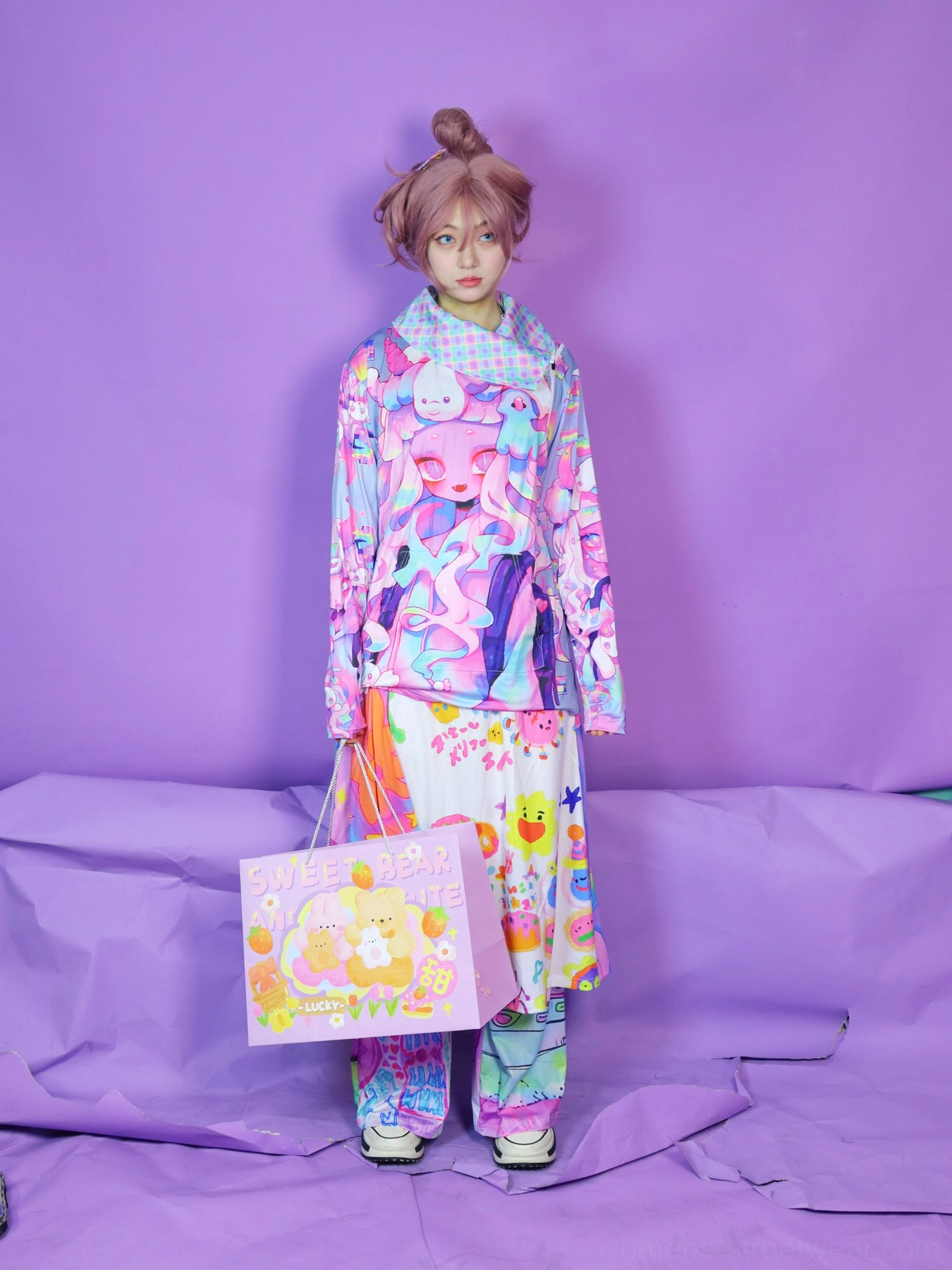 Front view of a long-sleeve anime graphic mesh collar sweatshirt paired with matching printed trousers for bold Y2K fashion