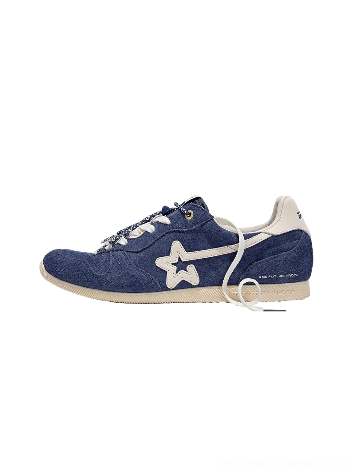 Navy blue low-profile retro suede panel sneakers with star-inspired side accents, white flat laces, and off-white rubber soles shown from the side