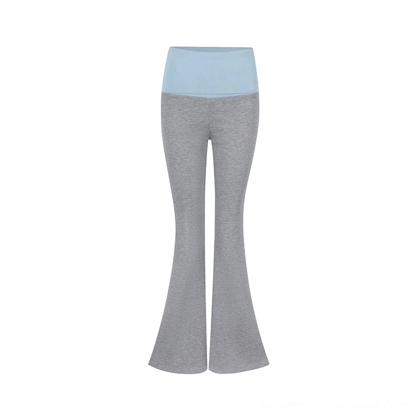 Gray low-rise colorblock fold-over micro flare yoga pants with light blue waistband in a fitted streetwear silhouette