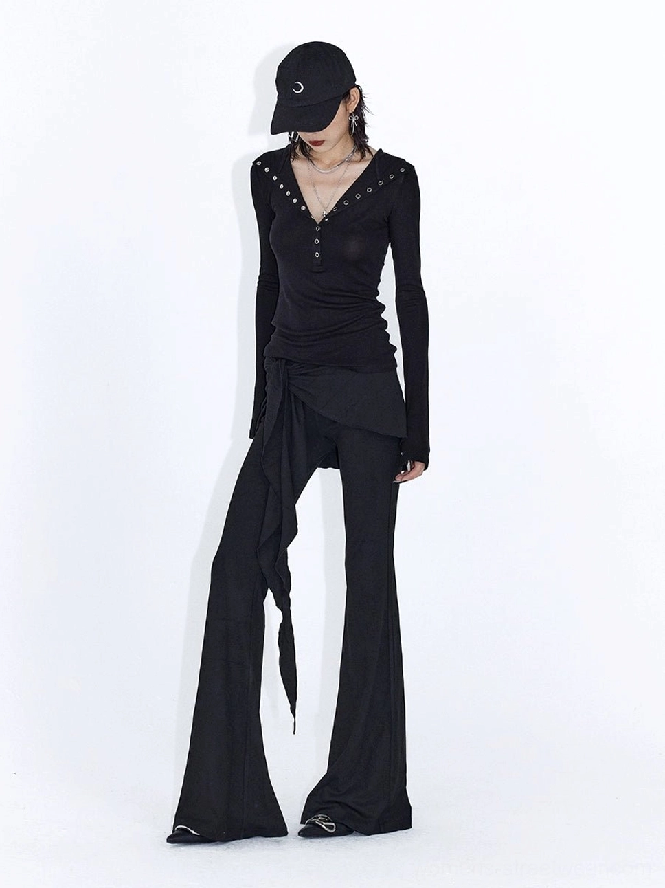 Low rise wrap drape flare streetwear pants with a leg lengthening silhouette and soft jersey movement