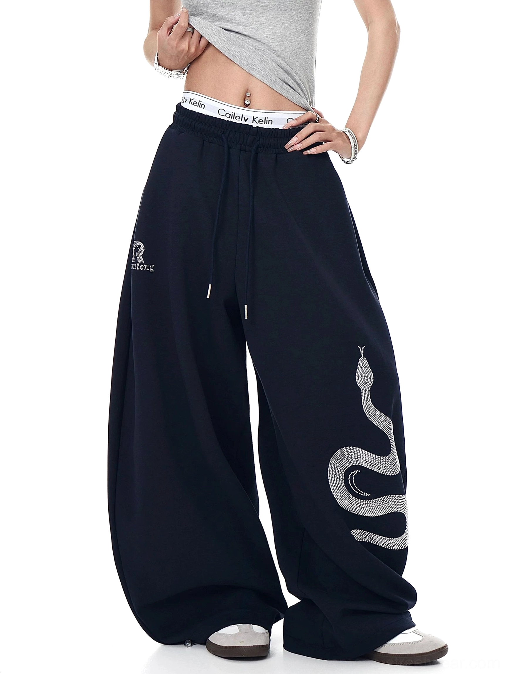 Navy Blue Lunar Serpent wide-leg fleece sweatpants with relaxed baggy silhouette, thigh serpent graphic, and adjustable streetwear waistband