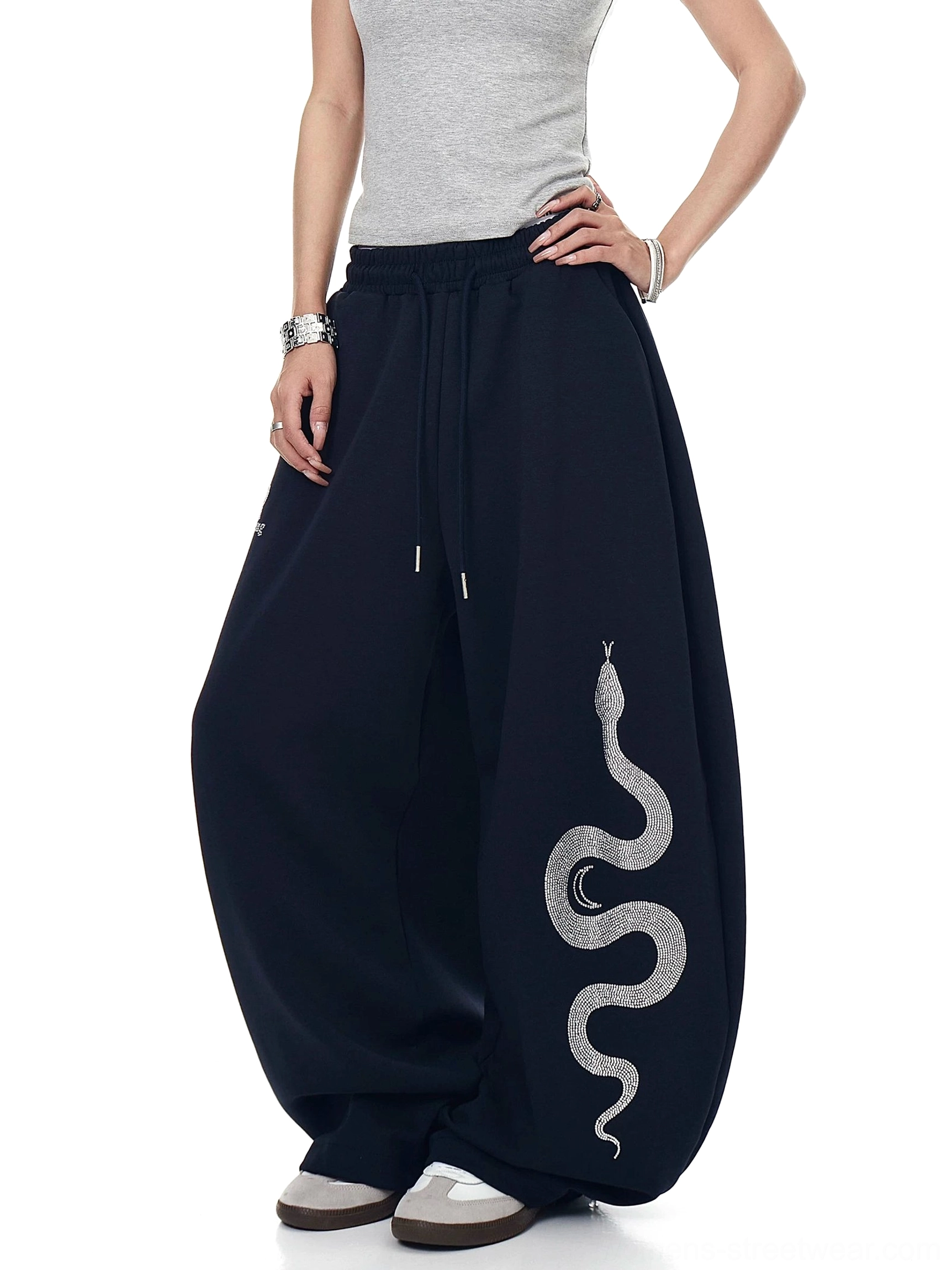 Navy Blue baggy wide-leg fleece sweatpants with serpent thigh motif, elastic drawstring waist, and dramatic oversized Y2K streetwear shape