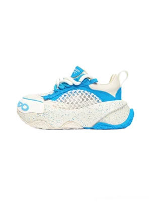 Macaron blue mesh chunky dad sneakers in blue and off-white shown in left side profile with layered leather panels and speckled sole