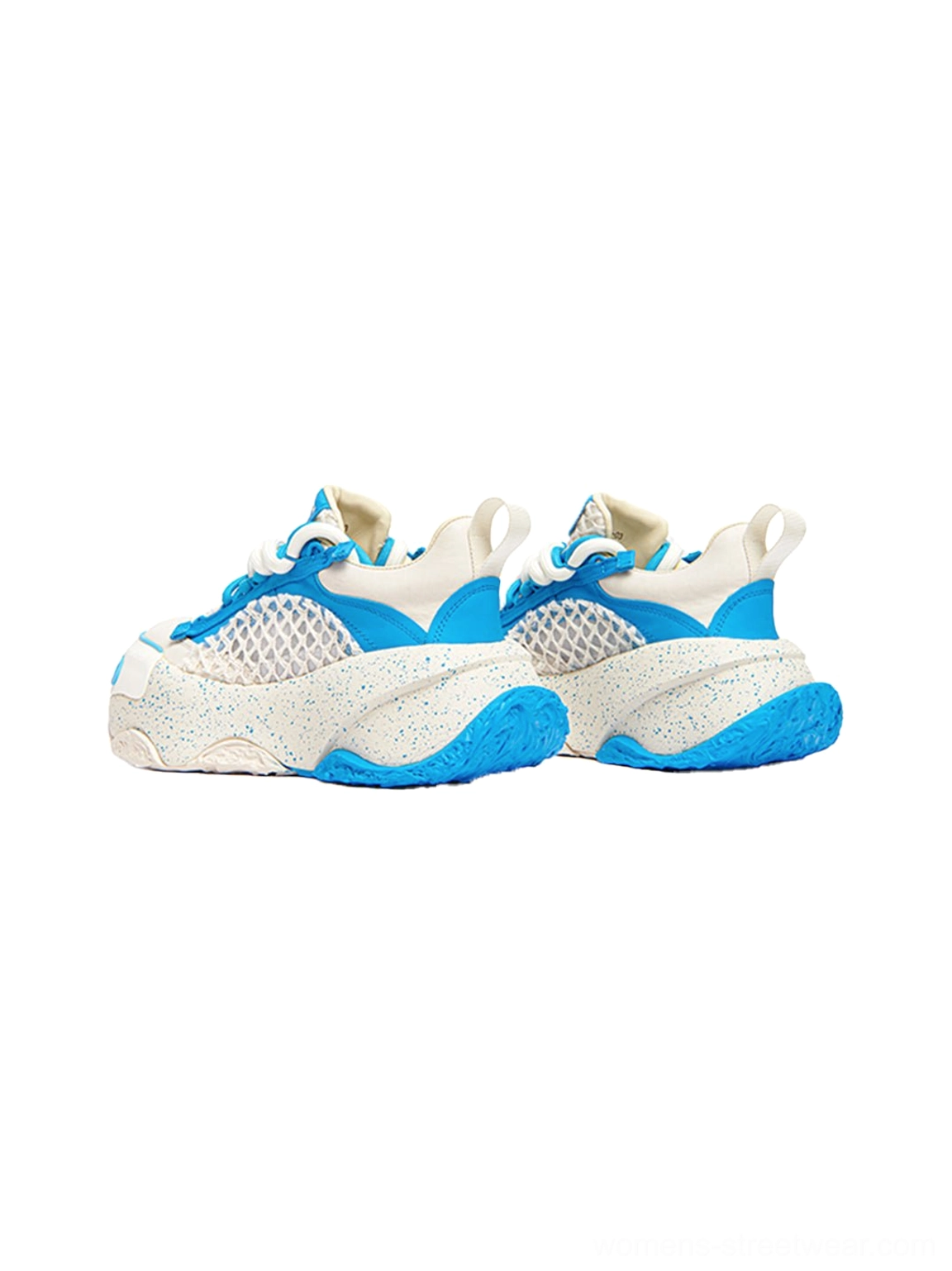 Low side view of macaron blue and off-white chunky dad sneakers highlighting the sculptural paint-speckled thick sole