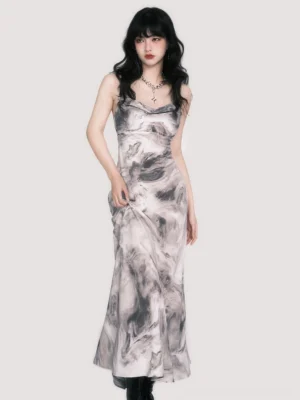 Front full-body view of grey black marble print satin slip maxi dress with cowl neckline spaghetti straps and fishtail hem