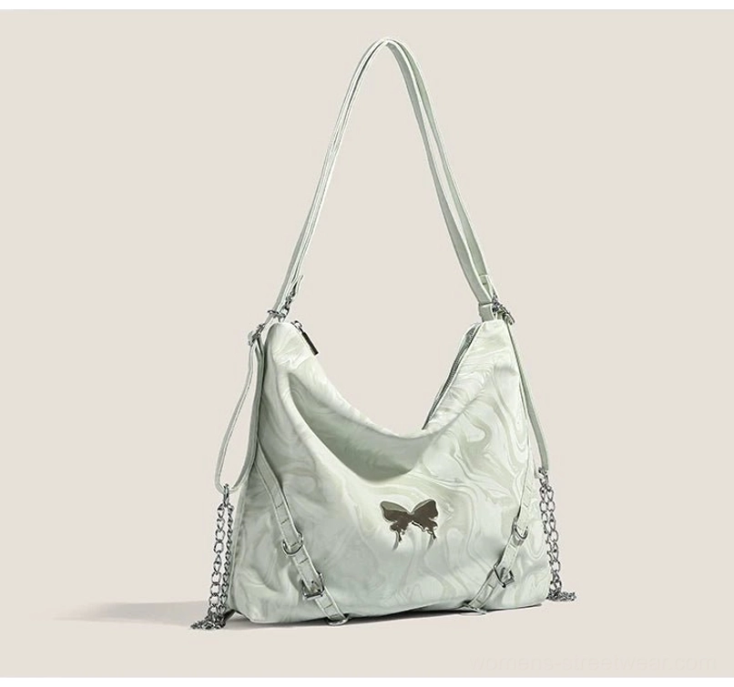 Mint green marbled butterfly chain hobo shoulder bag with silver hardware front angled view