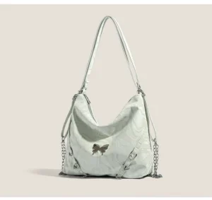 Mint green Y2K butterfly chain hobo shoulder bag front view with glossy marbled PU finish