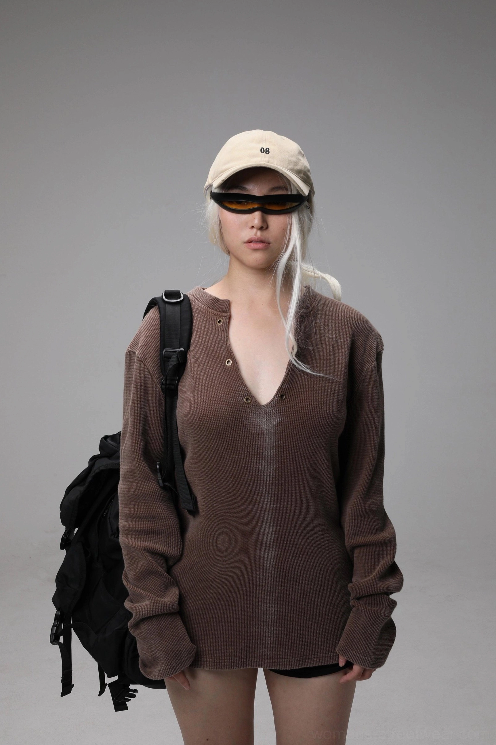 Maroon washed oversized Henley knit sweater with deep buttoned V-neck in gender-fluid streetwear styling