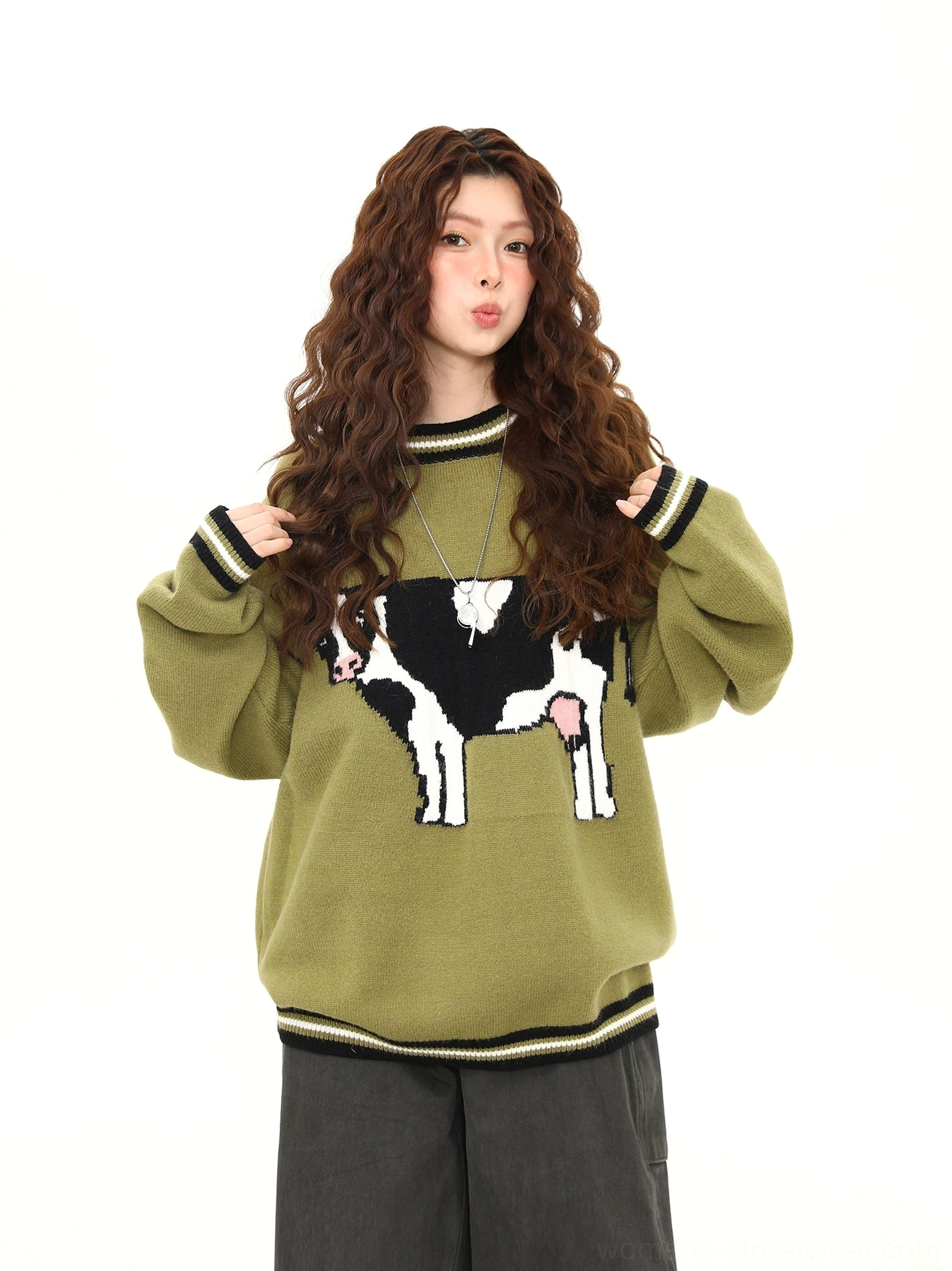 Women's matcha green cow graphic oversized streetwear sweater with striped ribbed neckline and cuffs