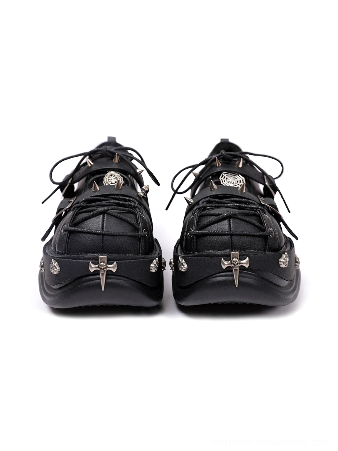 Matching pair of black gothic platform sneakers with identical metal emblems, cross decorations, lace-up cage upper, and thick chunky soles