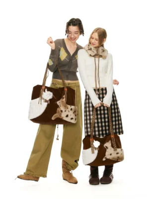 Matching dark brown velvet cat tote bags styled with preppy fall outfits and plush storybook cat decorations