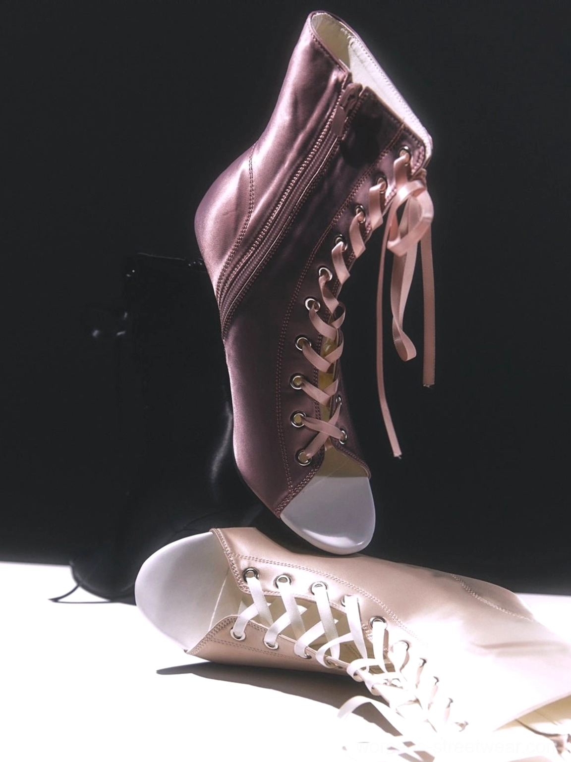 Metallic dusty rose satin lace-up peep-toe ankle stiletto heels shown in a dramatic low-angle product view