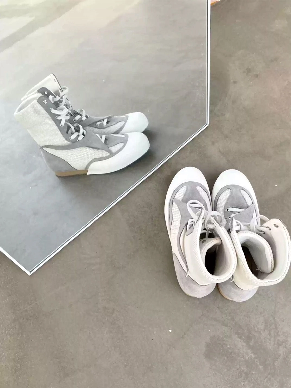 Multiple metallic mesh high-top boxing boots with breathable panels, textured overlays, rubber toe caps, and lace-up fronts
