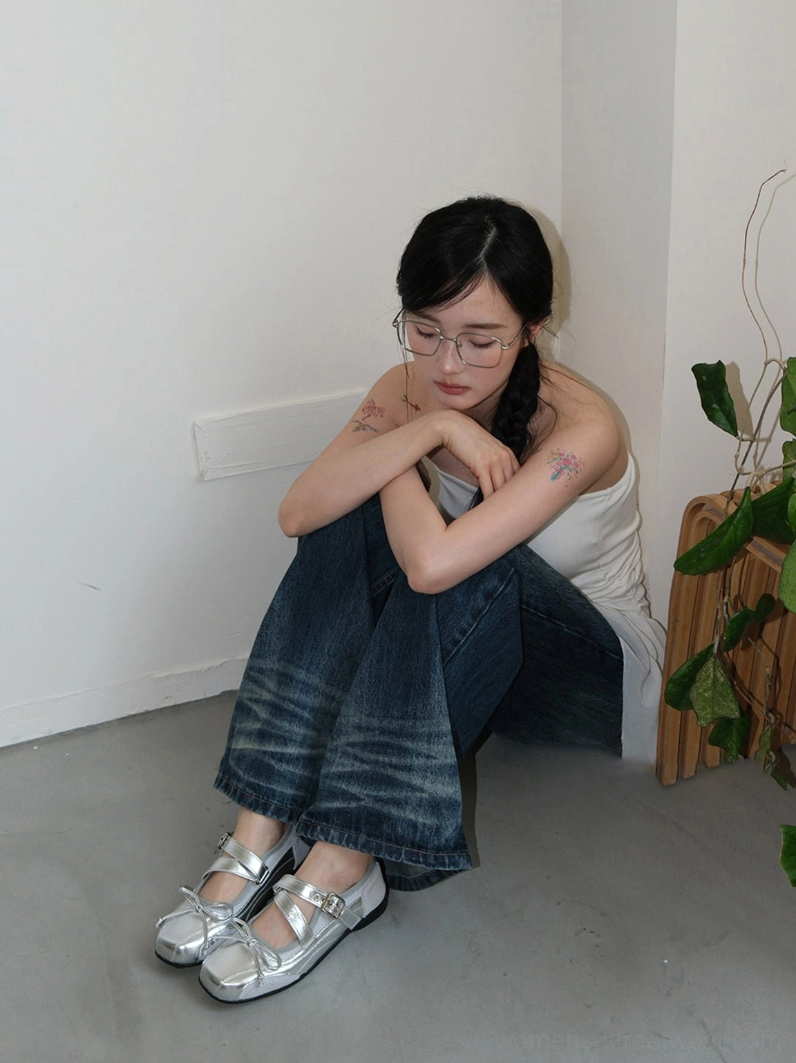 Metallic silver bow flats for women featuring a Mary Jane strap and low platform sole