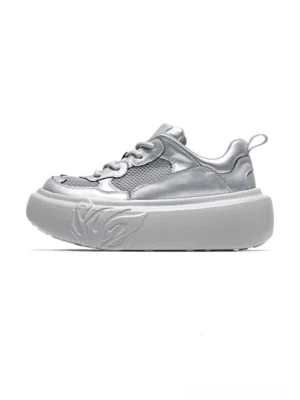 Single metallic silver platform sneaker with mesh panels, laminated leather-look upper, flame embossed chunky sole, and rear heel pull tab