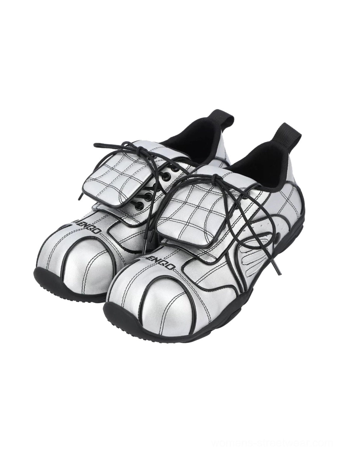Three-quarter front view of metallic silver quilted low-top sneakers featuring foldover tongues, black laces, and layered panel construction