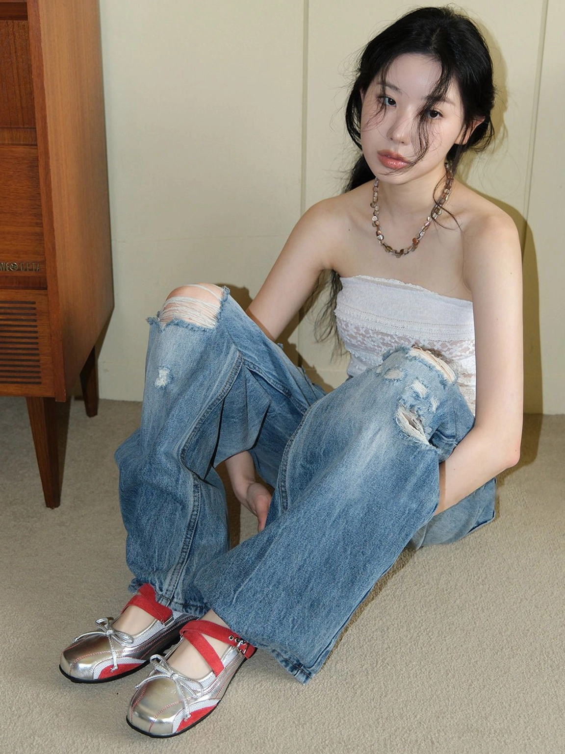 Metallic silver and red bow Mary Jane flats for women styled as contemporary Y2K streetwear footwear
