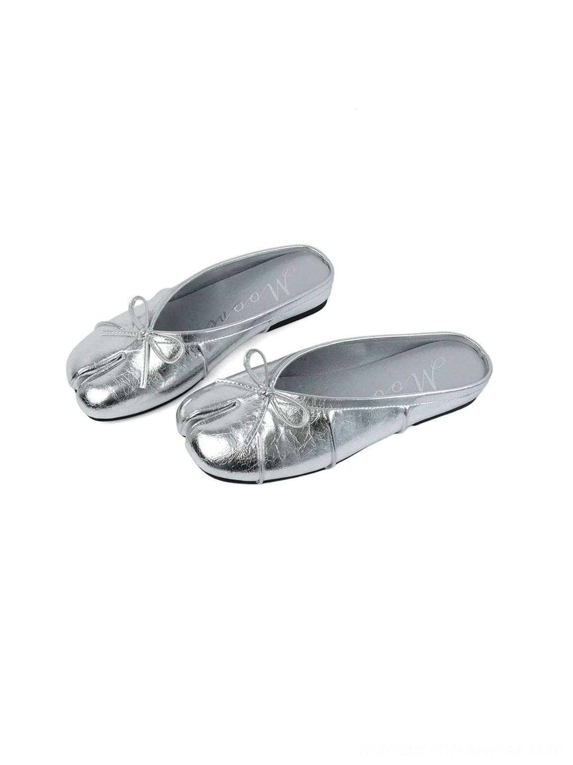 Metallic silver split tabi toe bow strap slip-on mules with shiny finish and low-profile flat sole
