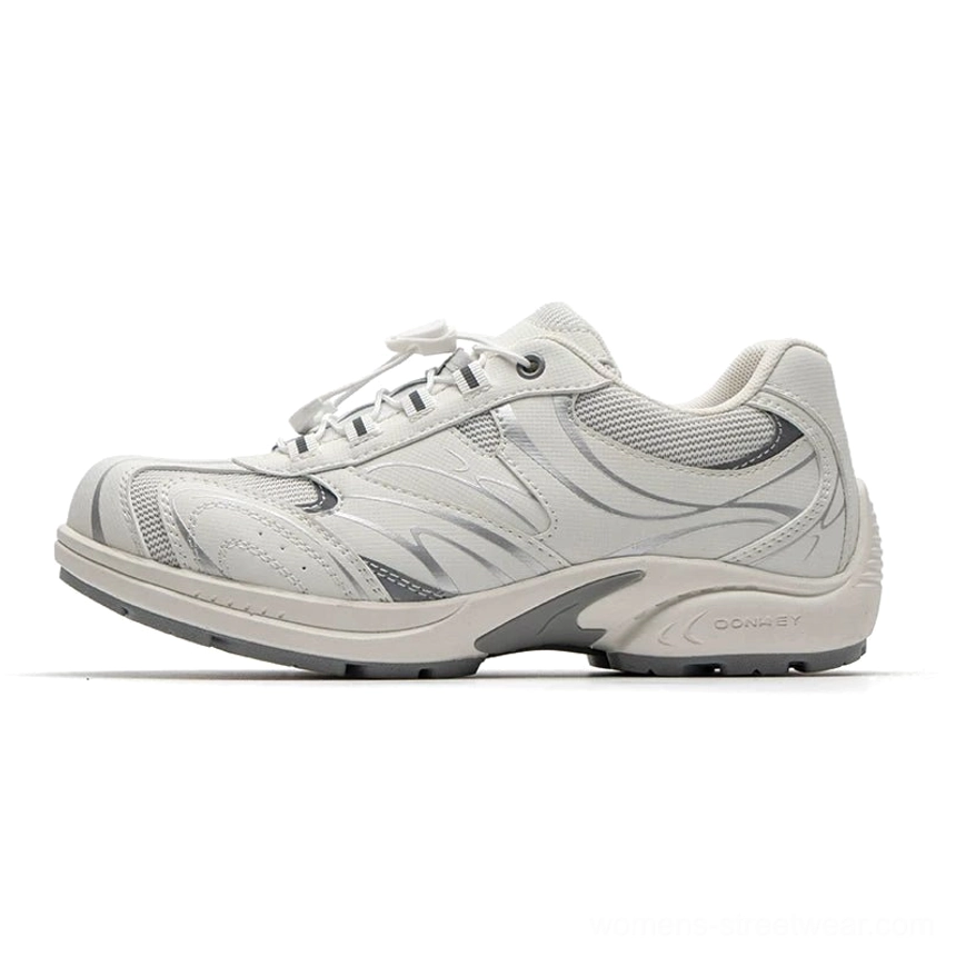 Off white and light gray retro runner streamline trail sneakers with chunky sculpted sole in studio side view