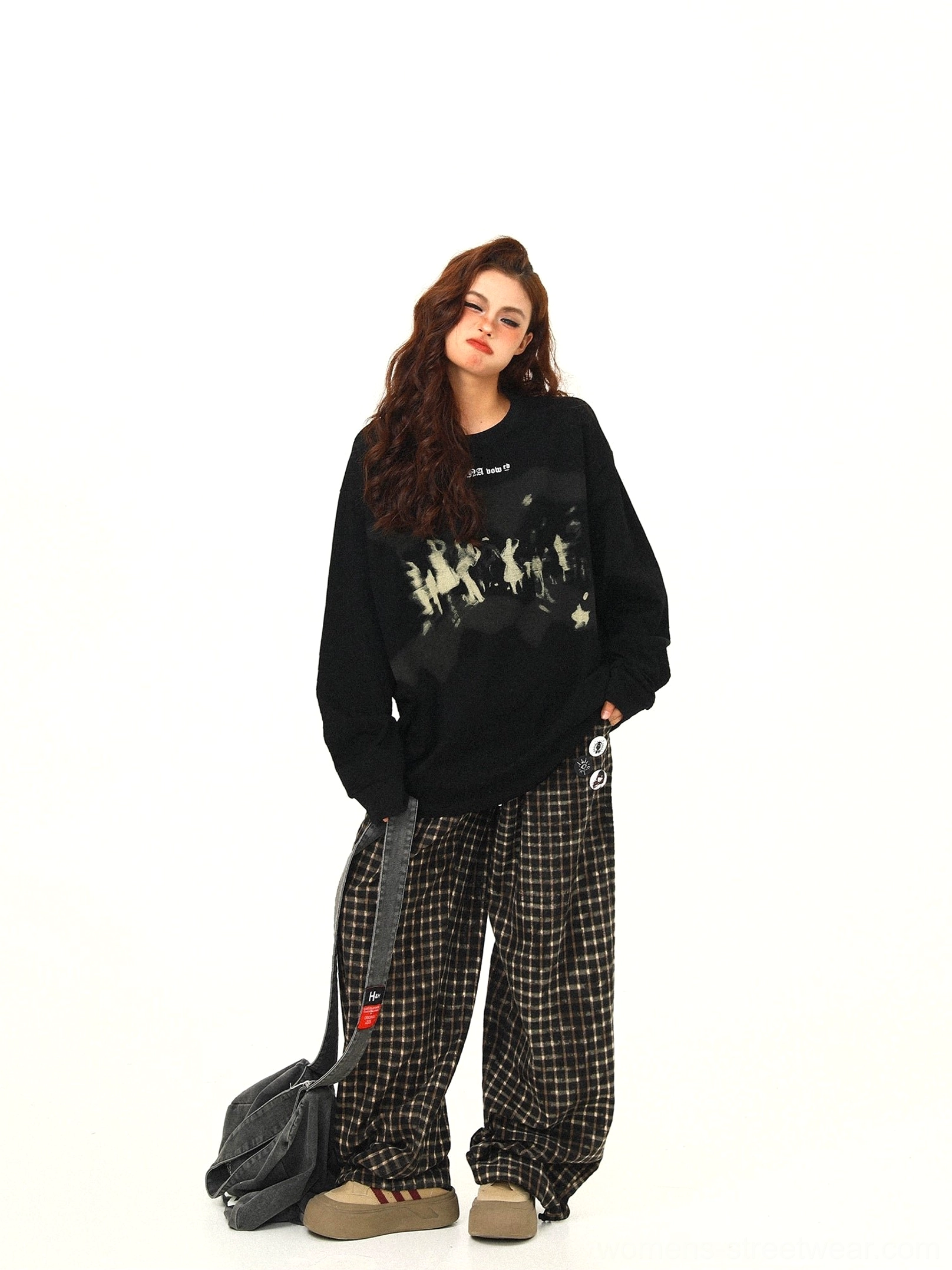 Side-back view of black crowd graphic sweatshirt showing oversized loose cut, solid back, and relaxed dropped shoulder sleeves