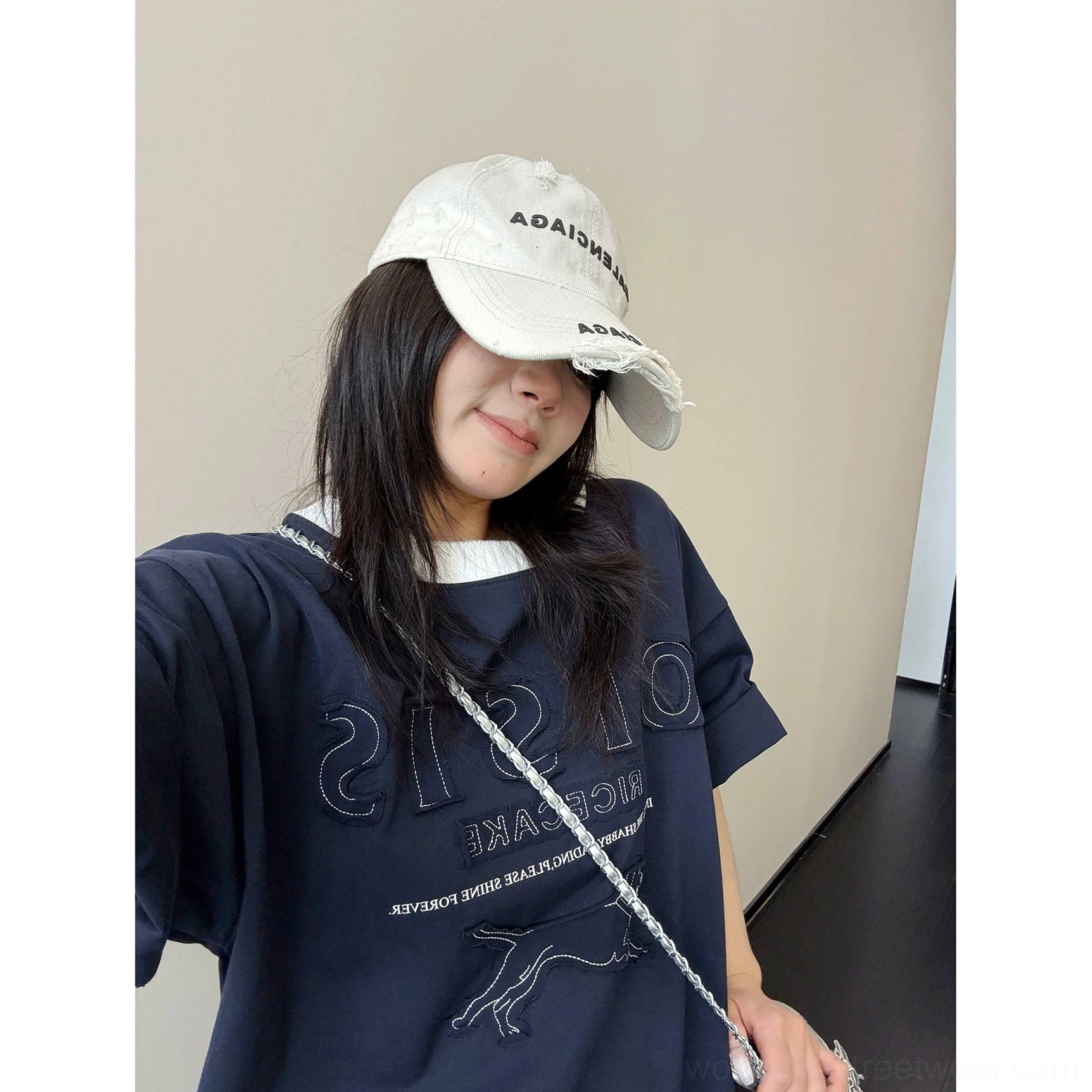 Navy blue Midnight Hound oversized streetwear tee with subtle embroidered graphic and layered contrast collar
