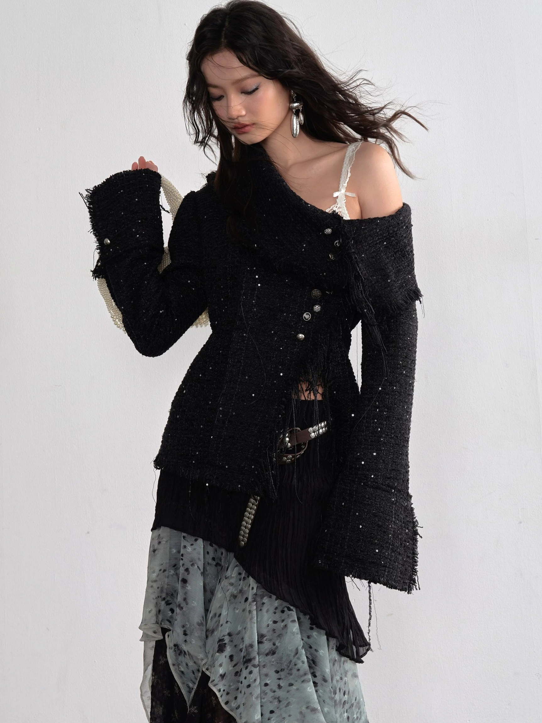 Dark romantic streetwear outfit detail with Midnight Mist asymmetrical layered chiffon maxi skirt and cascading ruffle hem