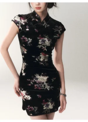 Short floral velvet cheongsam dress displayed from the front, featuring a black velvet base, jewel-toned peony print, Mandarin collar, cap sleeves, and fitted above-knee silhouette