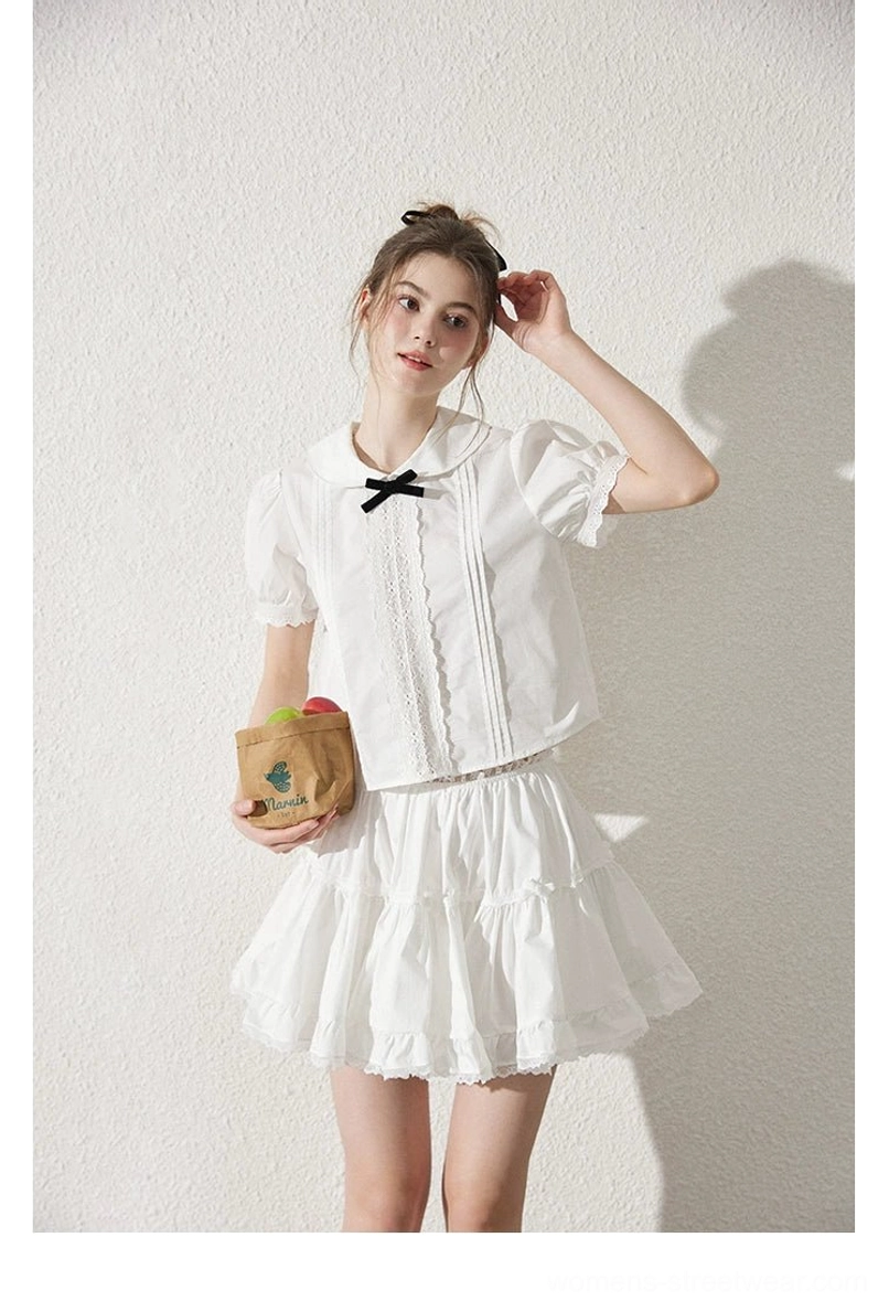 Milk white ruffle mini skirt and Peter Pan collar blouse modern academia fashion outfit detail