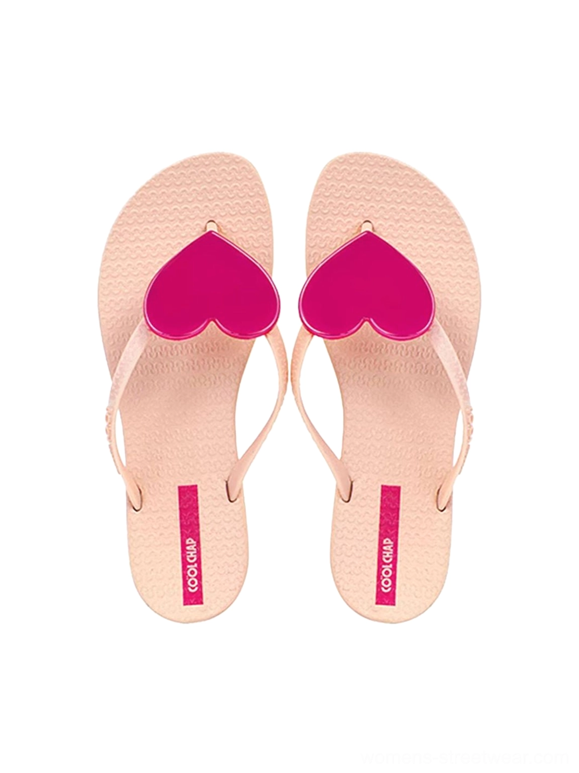 Pair of light nude heart plaque thong flip-flops for women in overhead product view