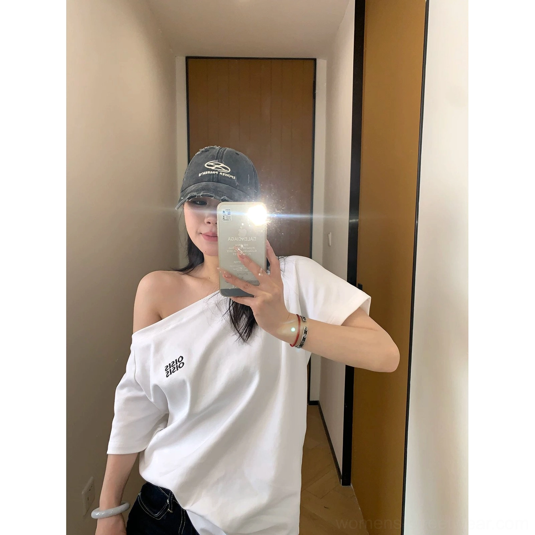 Minimalist women's asymmetrical logo tee designed for relaxed Y2K outfits, casual layering, and everyday streetwear